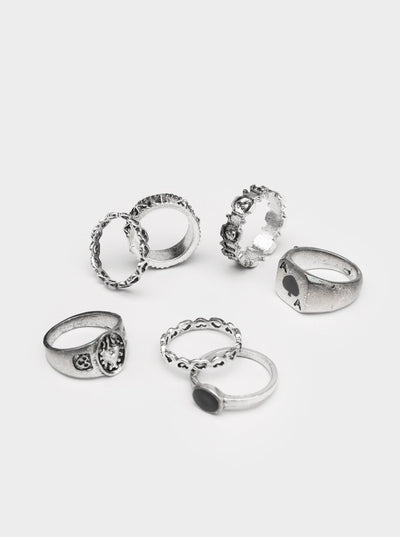 Silver rings set with stones in black