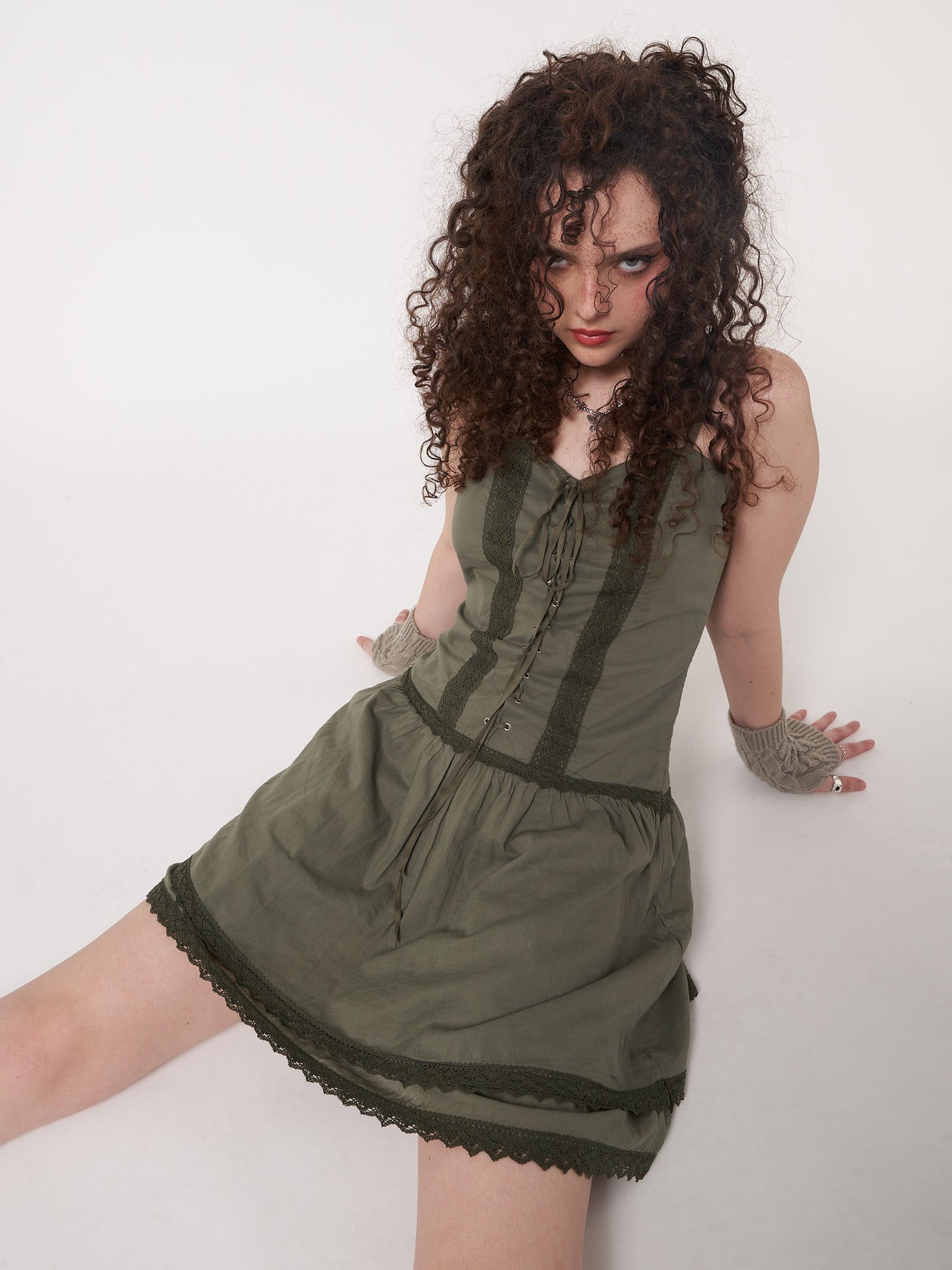 Lace up corset dress in foggy green with crochet lace trims and double-layer skirt 