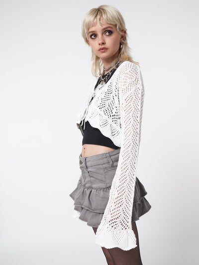 Tie front cardigan in white featuring crochet style knit pattern 