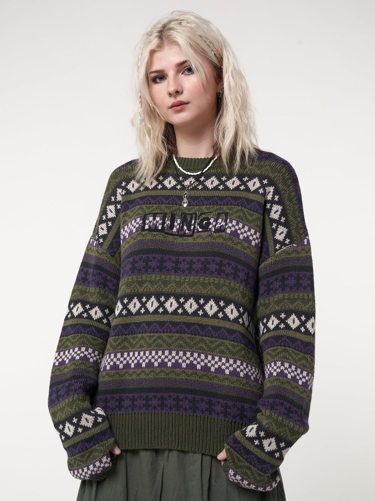 Jacquard knit jumper in green and purple with thumbhole cuffs