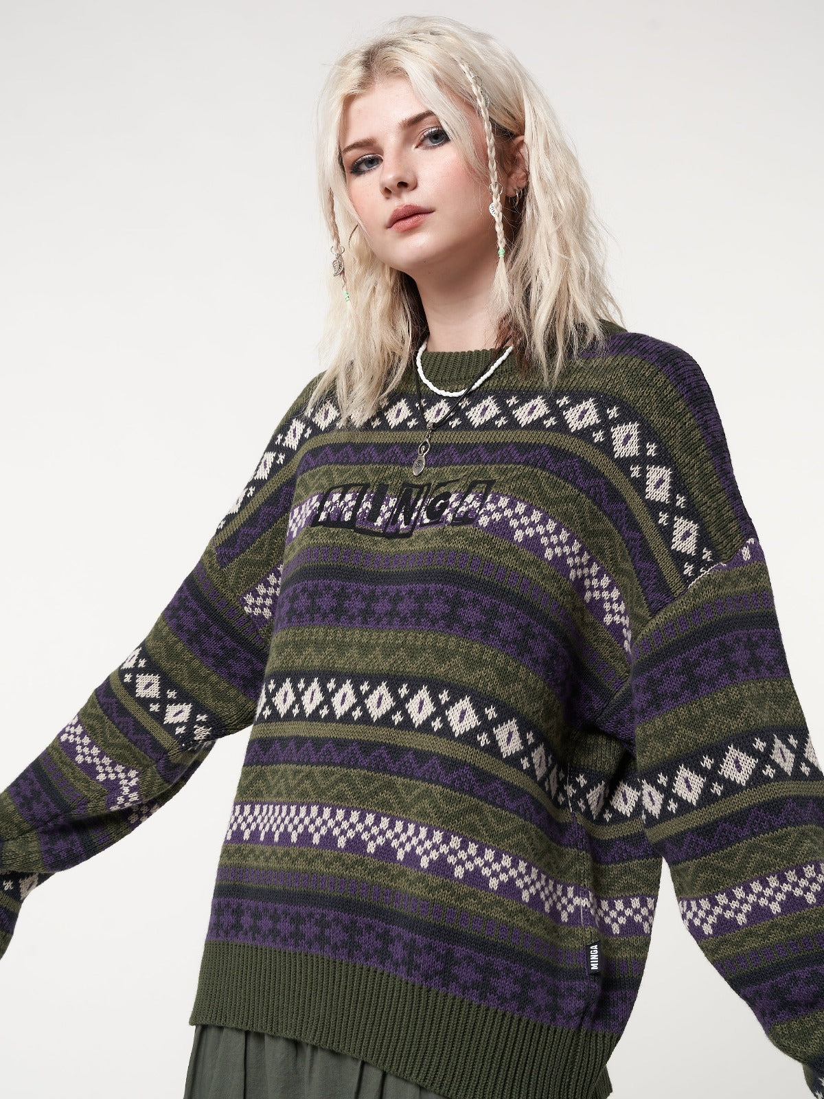 Jacquard knit jumper in green and purple with thumbhole cuffs