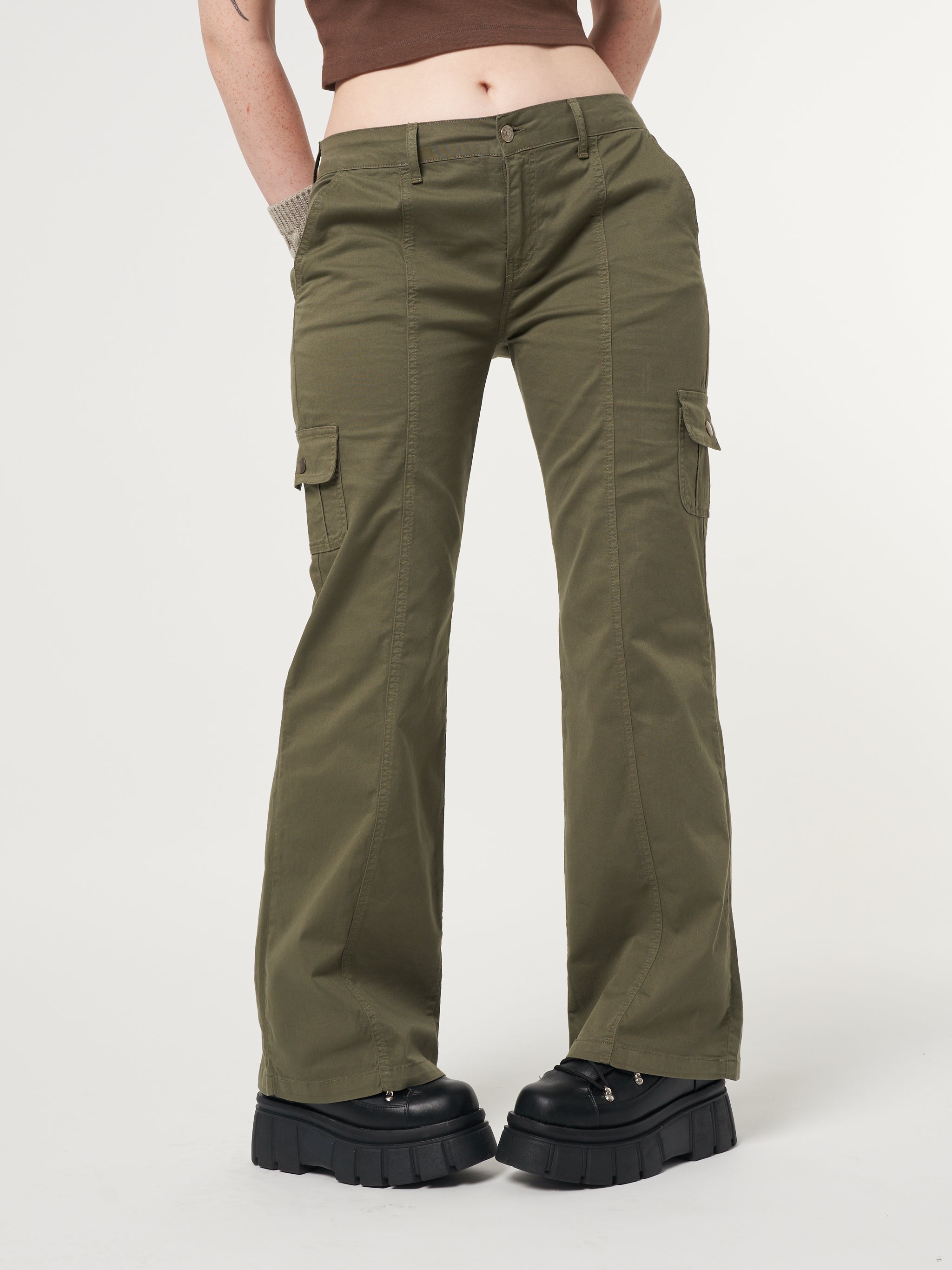 Low rise cargo pants in olive green featuring flared legs