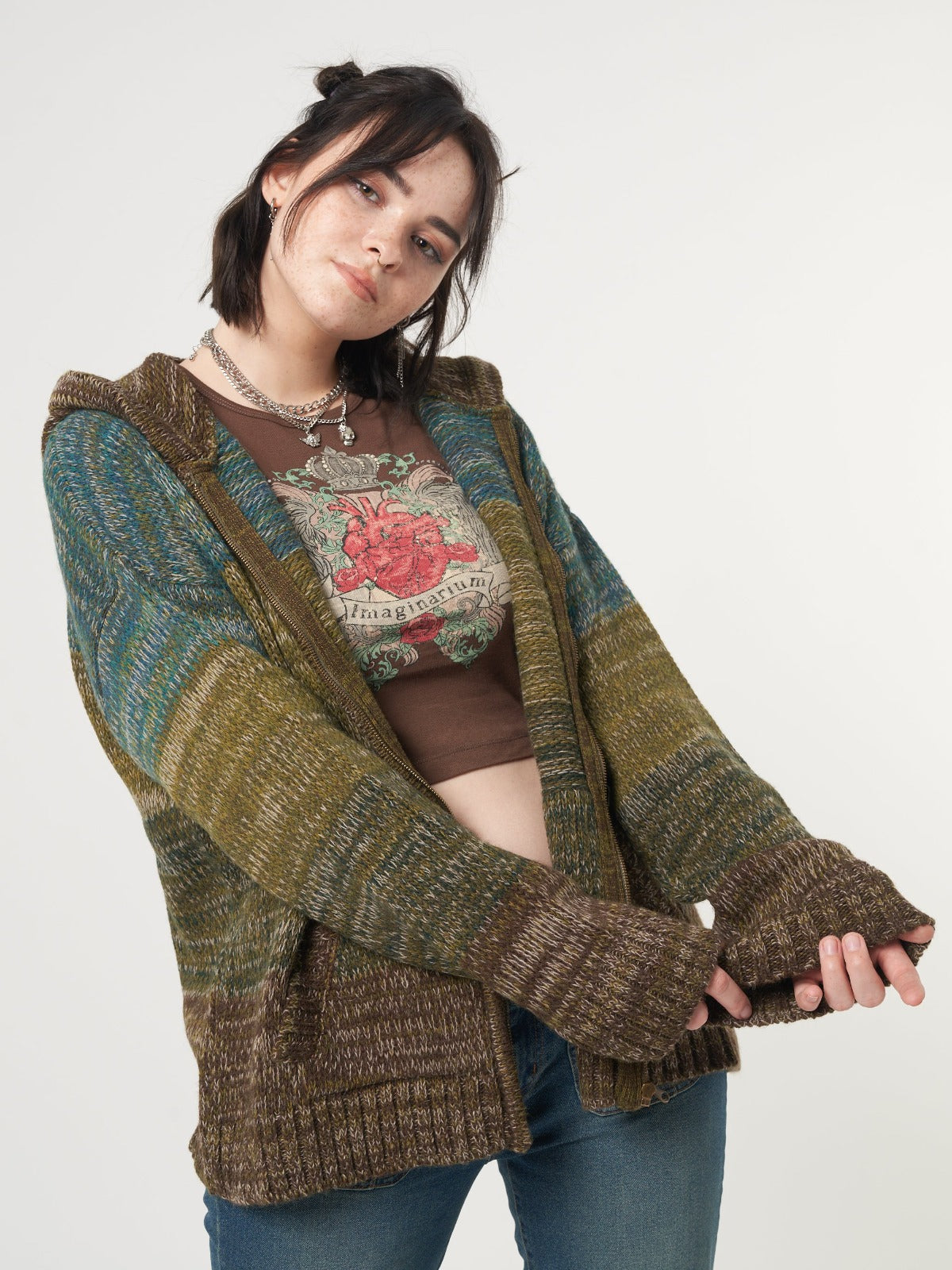 Zip up hood knitted cardigan featuring degrade striped in green, brown and blue tones