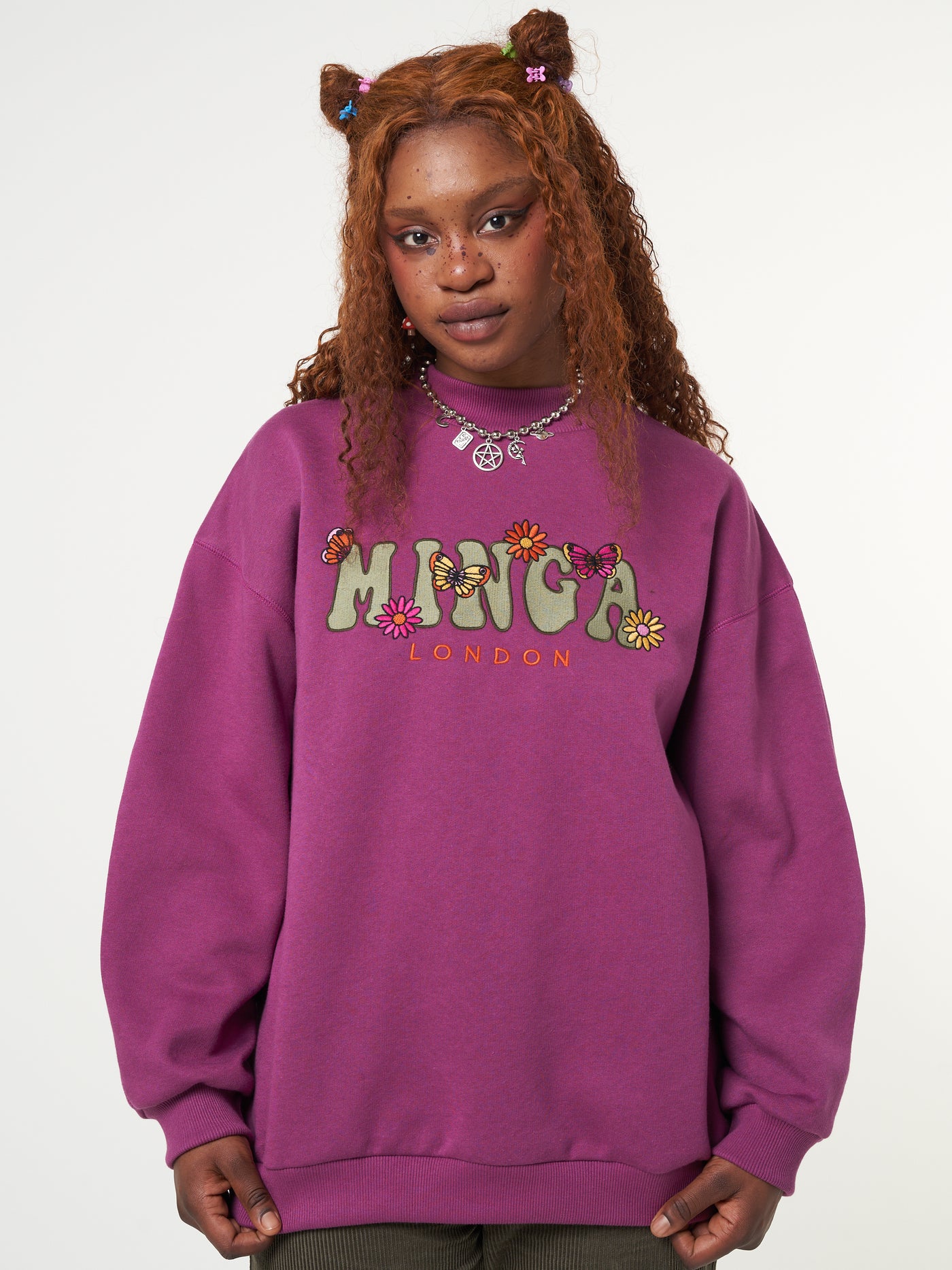 Oversized fit sweater in purple orchid with Minga London flowers and butterflies front embroidery