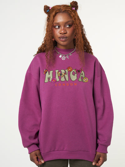 Oversized fit sweater in purple orchid with Minga London flowers and butterflies front embroidery