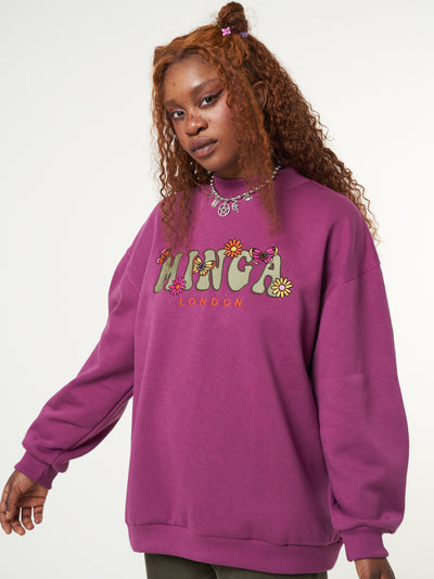 Oversized fit sweater in purple orchid with Minga London flowers and butterflies front embroidery