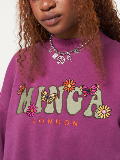 Oversized fit sweater in purple orchid with Minga London flowers and butterflies front embroidery