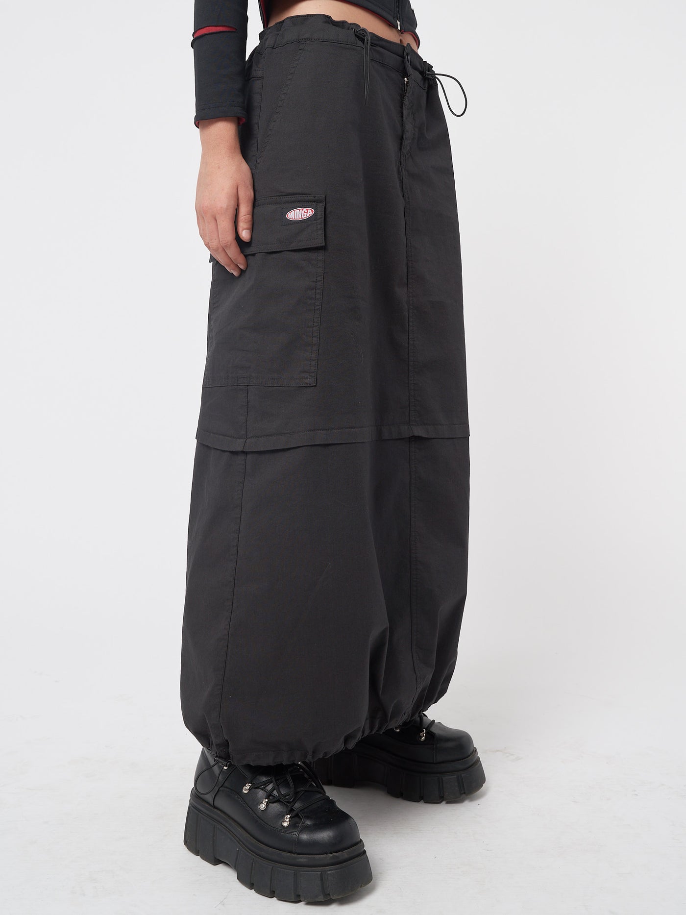 Black cargo maxi skirt in parachute style with side utility cargo pockets