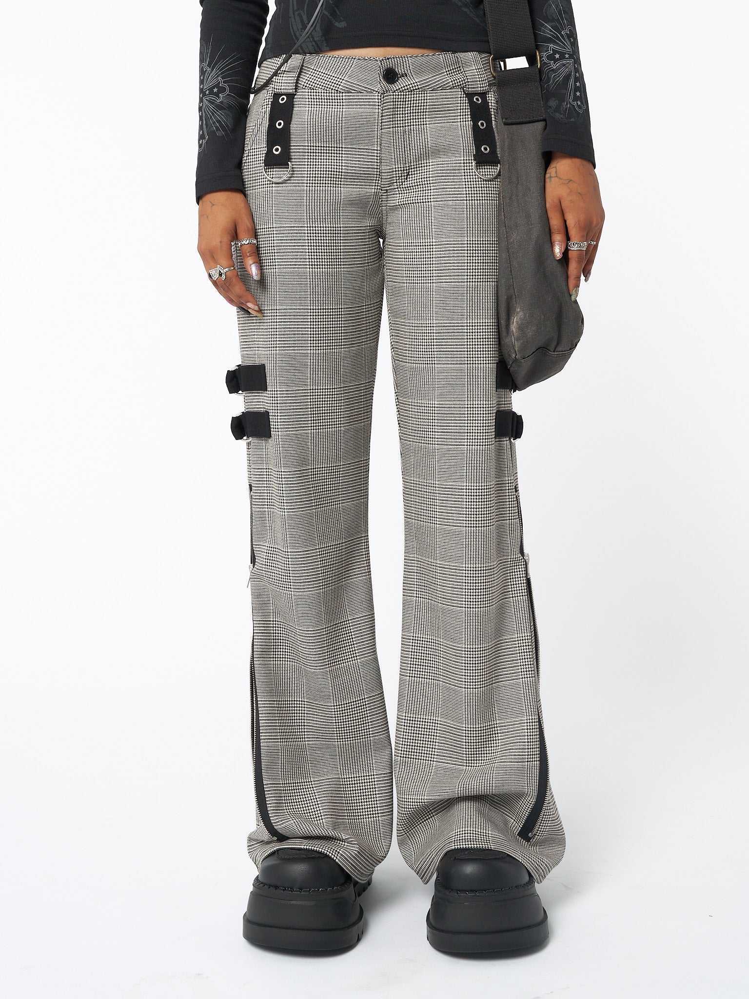 Side zip flare pants in plaid grey with grommet eyelet strip and D-ring details