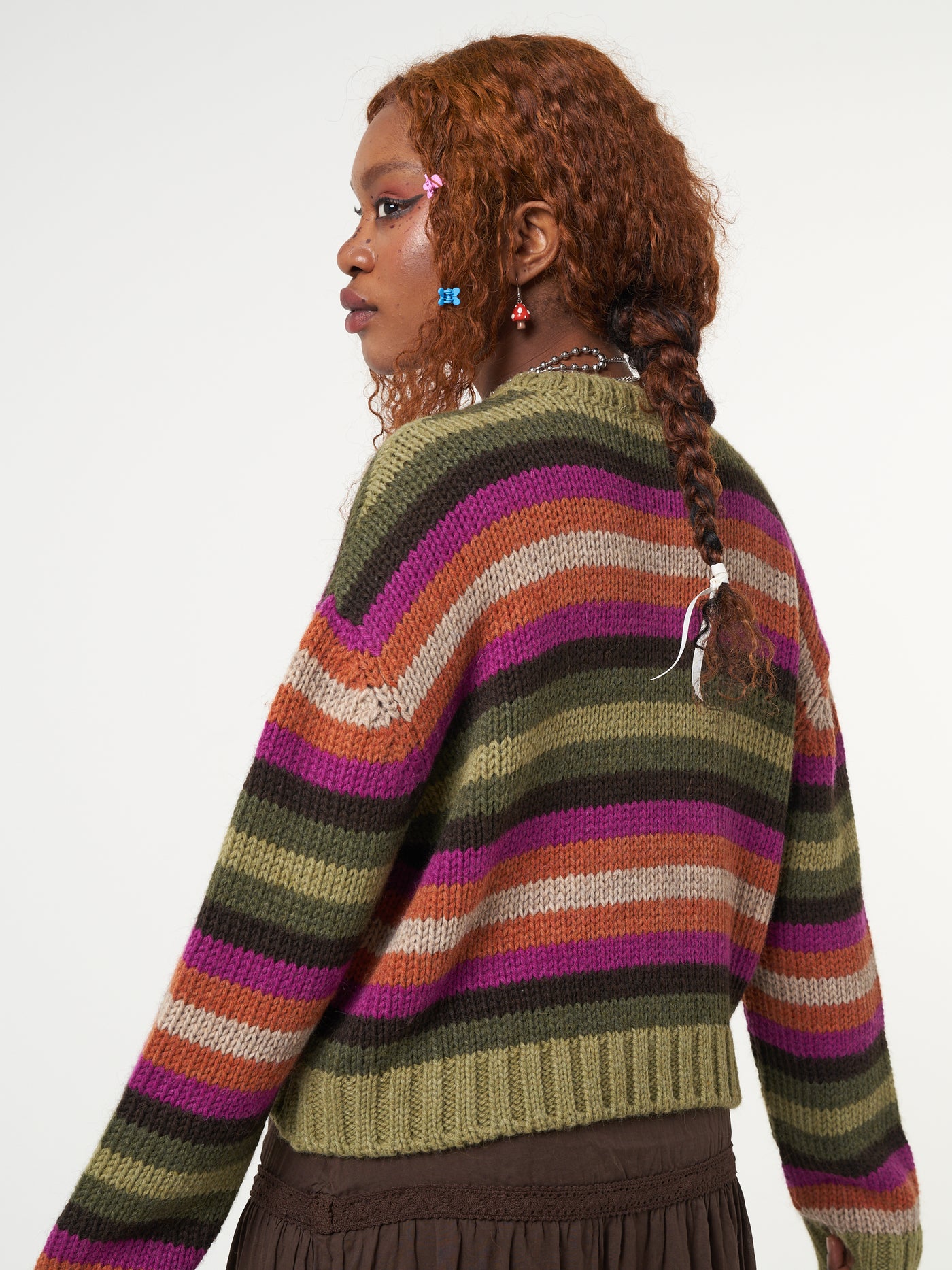 Knitted jumper in orange, pink, green and brown stripes featuring front Retro Flower embroidery