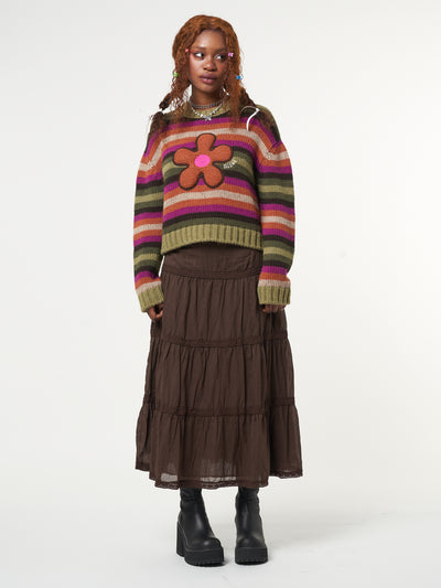 Knitted jumper in orange, pink, green and brown stripes featuring front Retro Flower embroidery