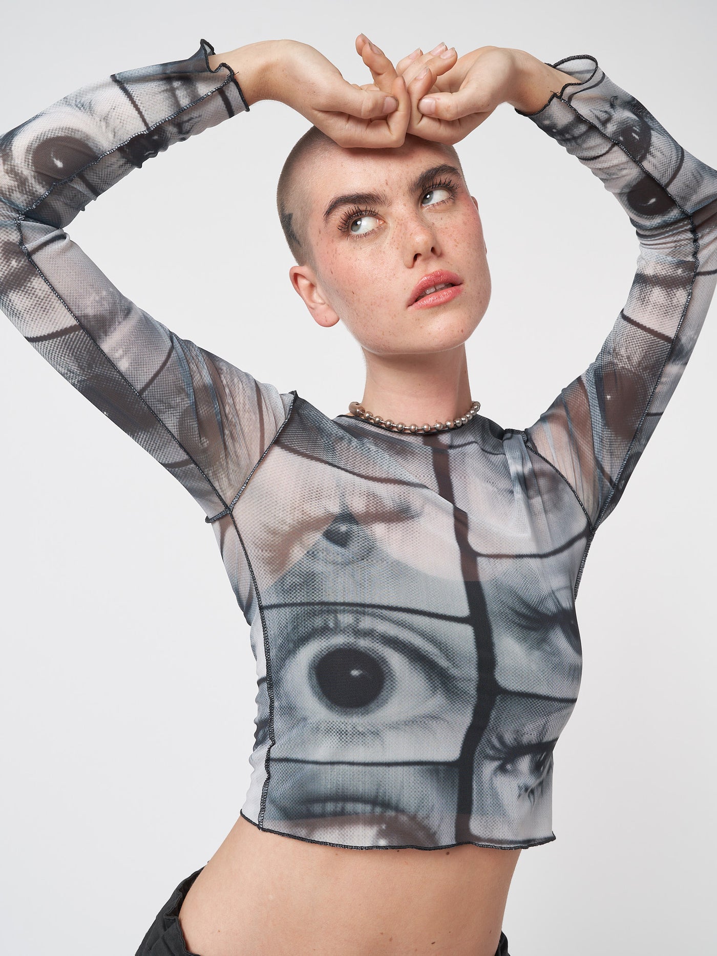 Mesh crop top with all over Mirror Eyes graphic print 